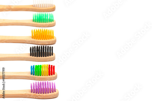 Set made of bamboo toothbrushes isolated on white background. Plastic free.