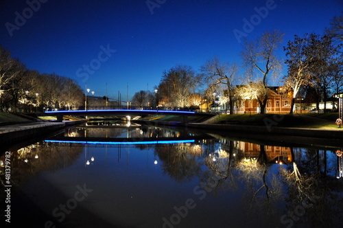Reflections on the river in the city of Salo in Finland