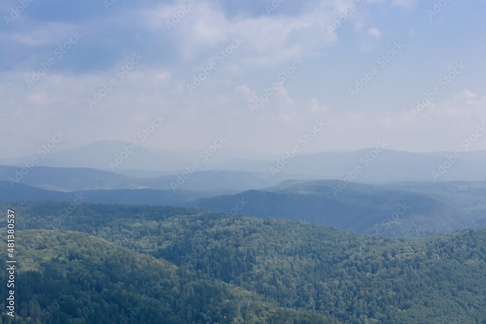 Foggy mountain forest hills in nature reservein Russia