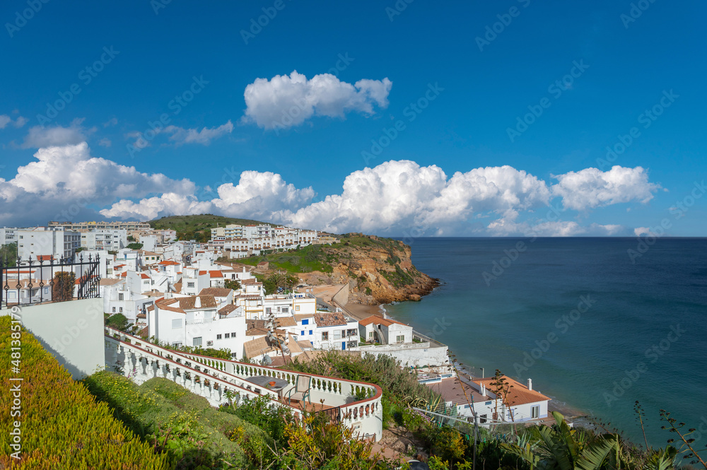 Obraz premium Village and coast of Burgau in the Algarve