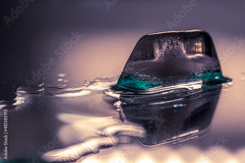 Fotografia Melting ice on a dark background