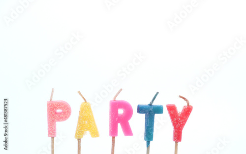 A candle with the word 