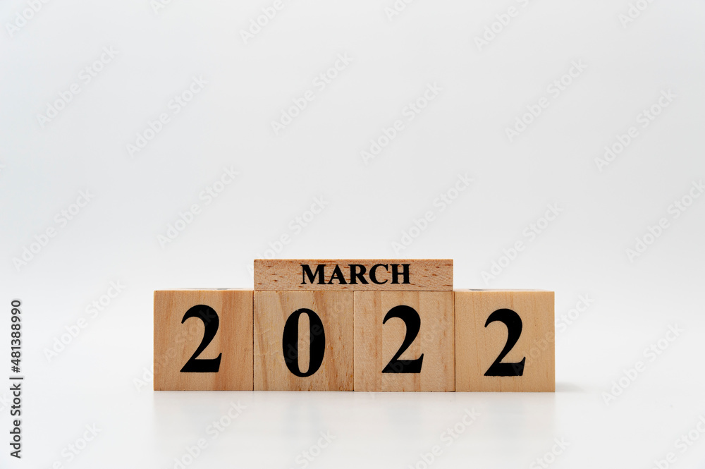 March 2022 written on wooden blocks isolated on white background with copy space March 2022 written on wooden blocks isolated on white background with copy space