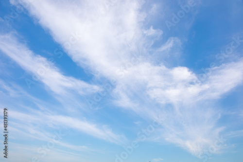 Blue sky with small white clouds for background usage. © Phongsak
