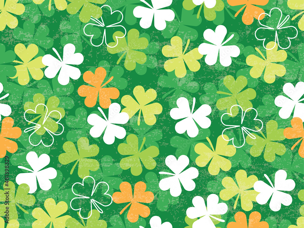 Seamless vector pattern of scattered clovers and shamrocks. This repeating pattern is perfect for a St Patricks Day background or surface design.