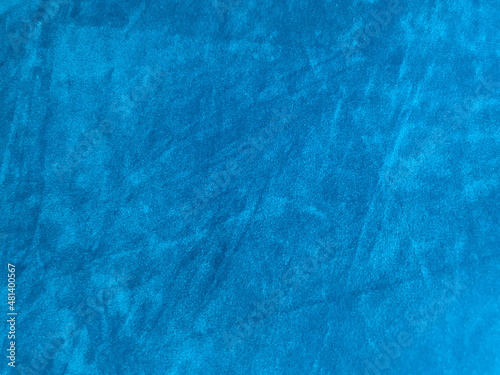 Blue velvet fabric texture used as background. Empty blue fabric background of soft and smooth textile material. There is space for text..