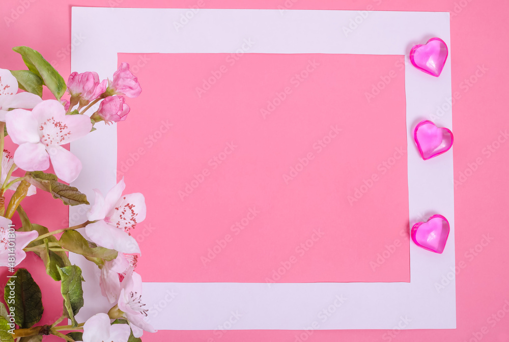 Pink background card for Valentines day with copy space, white frame with hearts and flowers