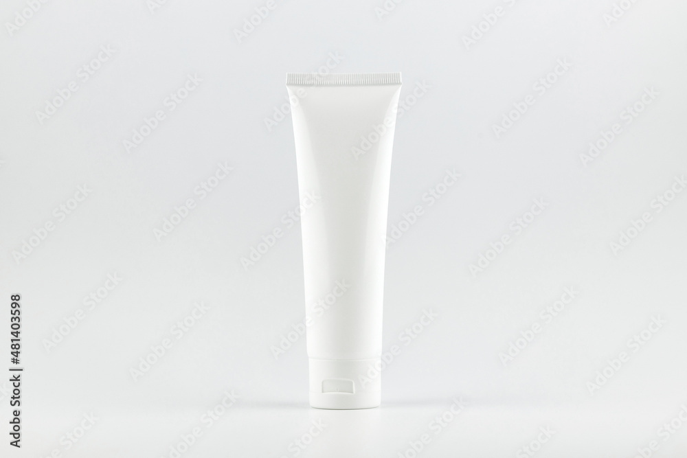 white unbranded tube on white background. cosmetic mockup. branding identity mockup concept white unbranded tube on white background. cosmetic mockup. branding identity mockup concept