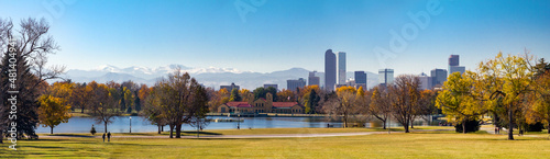 Panoramic view of downtown Denver Colorado from City Park in Fall with the Rocky Mountains in the background © deberarr