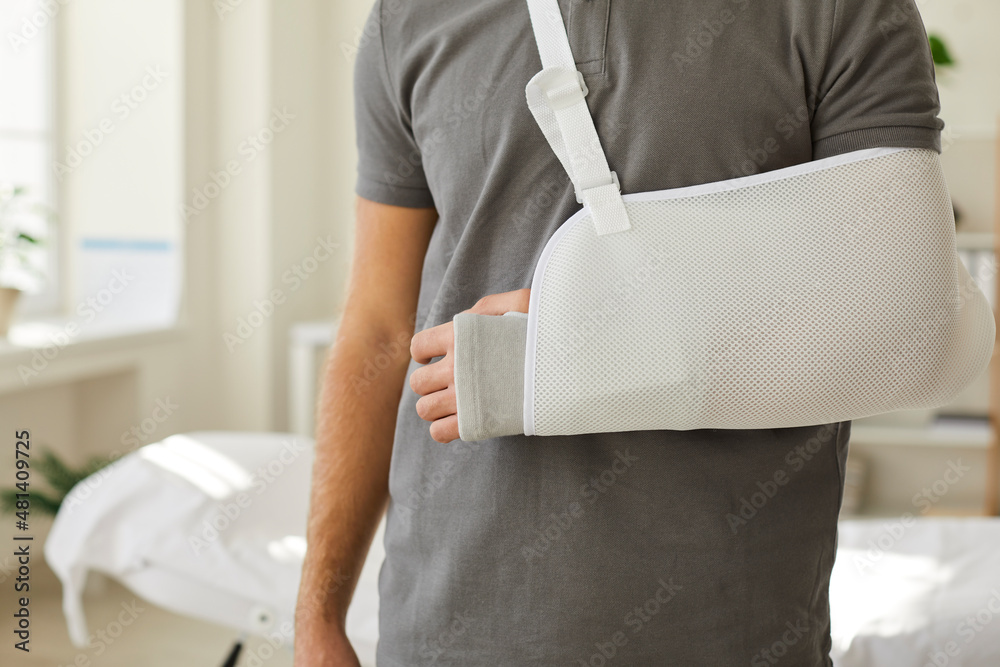 Man in sling hotsell