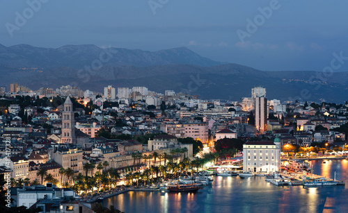 City of Split - Croatia night panorama with city lights and mountains in the background. © Filip