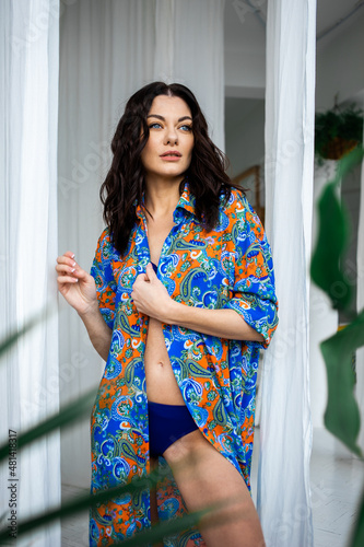 Beautiful woman beachwear clothes tropical resort