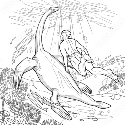 A young man swims with a chthyosaur in the ocean among coral reefs.
