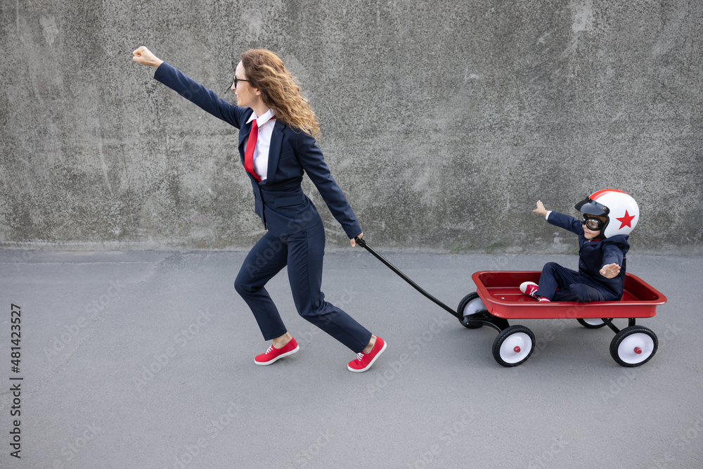 Happy woman and child going to work outdoor Happy woman and child going to work outdoor