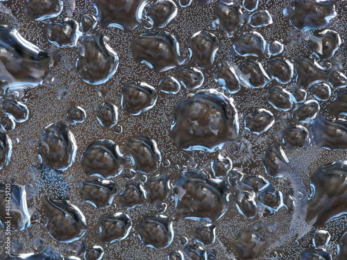 Closeup of water droplets on Perspex sheet