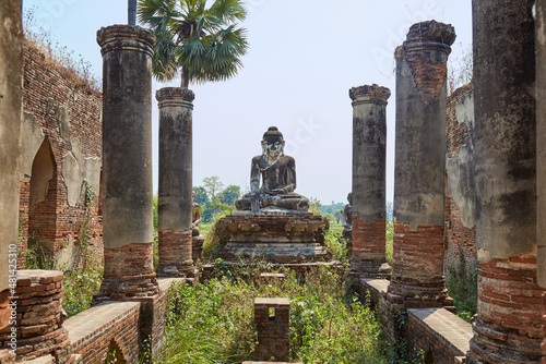 A Buddha Statue at Yadana Sinme Pagoda, Inwa, Myanmar photo