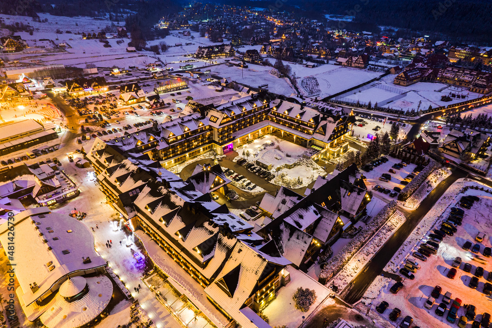 Bania Ski Resort and Hotel in Bialka, Poland at Winter Night . Drone View