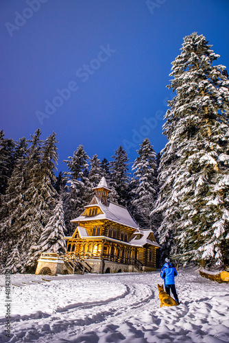  Man and Dog in Forest at Snowy Winter in Zakopane