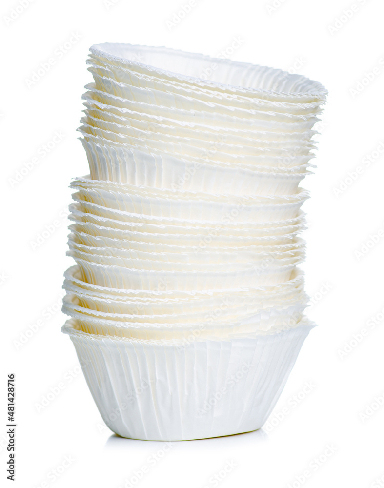 Obraz premium paper for muffins on white background isolation