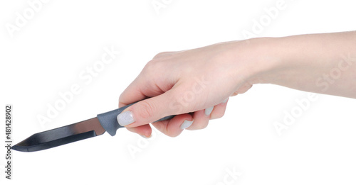 Gray knife for vegetables in hand on white background isolation