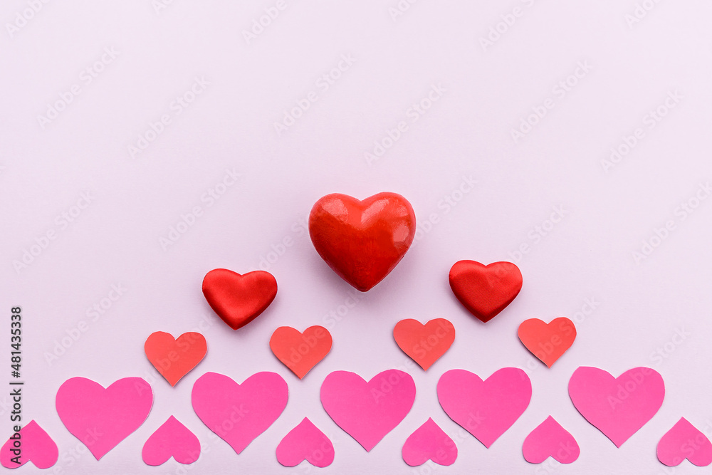 Red hearts on a romantic pink background. valentine's day. Romance and love.