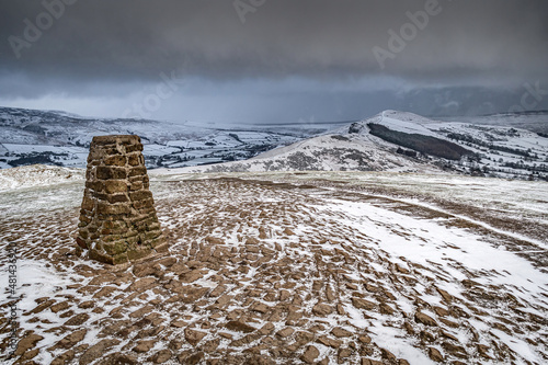 Billede på lærred Stone trig point on a snowy mountain