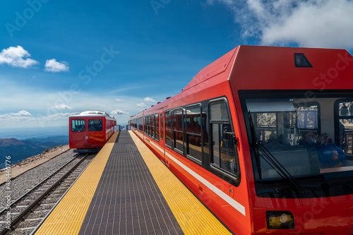Colorado Springs - 9-19-2021: A view of two pikes peak cog railway trains waiting to load passengers for their return trip to the lower station