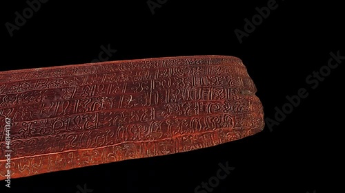 Wooden tablet ko hau rongo rongo - Rotation slide - 3d animation model on a black background photo