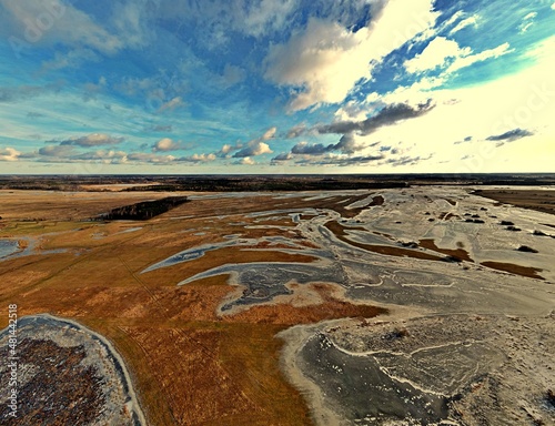 Panorama.View from the top of the backwaters of the Narew river ice-bound in winter.