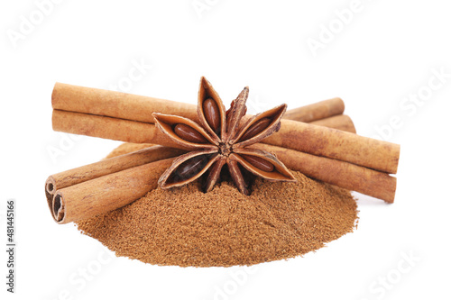Cinnamon powder, sticks and star anise isolated on white background