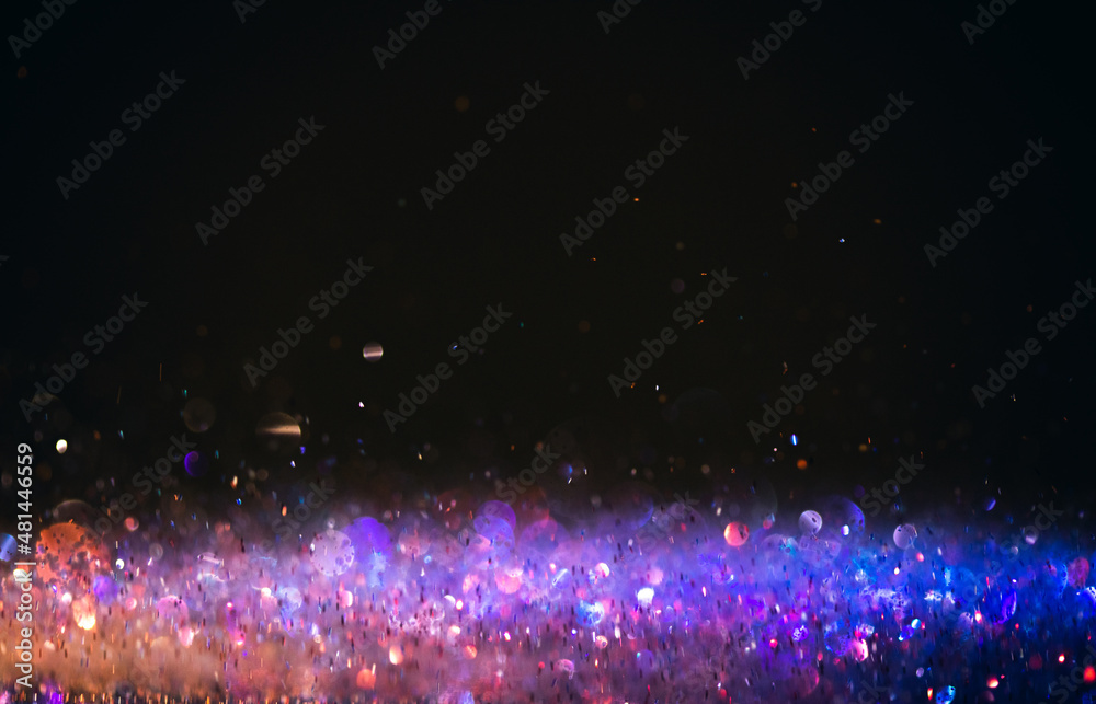 background of abstract glitter lights. purple and blue background of abstract glitter lights. purple and blue