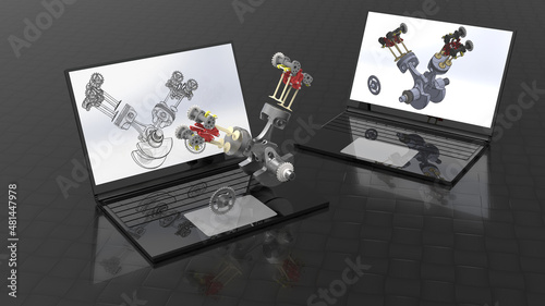 3D render - design an engine on a laptop photo