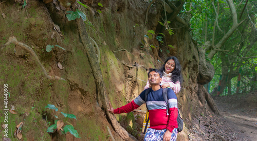 Happy Indian young couple hugging and laughing in love outdoors at Chilkigarh forest , Jhargram district in India. photo