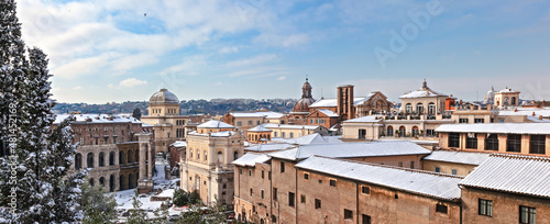 Theatre of Marcellus and Porticus Octaviae with snow, Rome, Italy photo