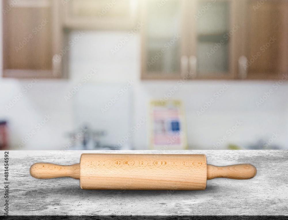 Fotografie Wooden rolling pin, on rustic wood background