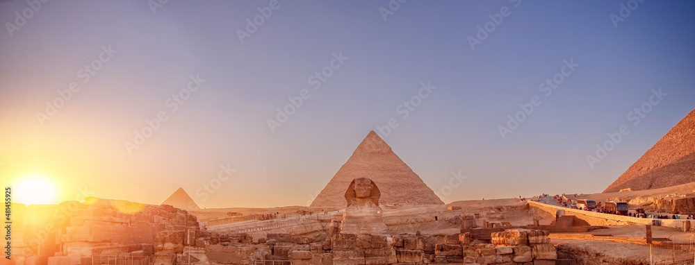 Banner Main tourist view famous wonder of world Sphinx and pyramids Giza, Egypt sunset sky - obrazy, fototapety, plakaty 