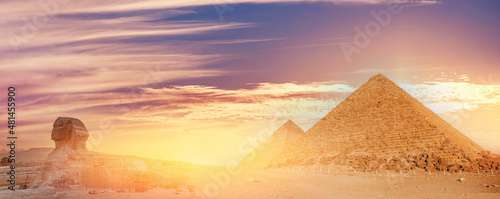 Fotografie, Obraz Pyramids of Giza in Cairo Egypt and Sphinx dramatic sunset sky