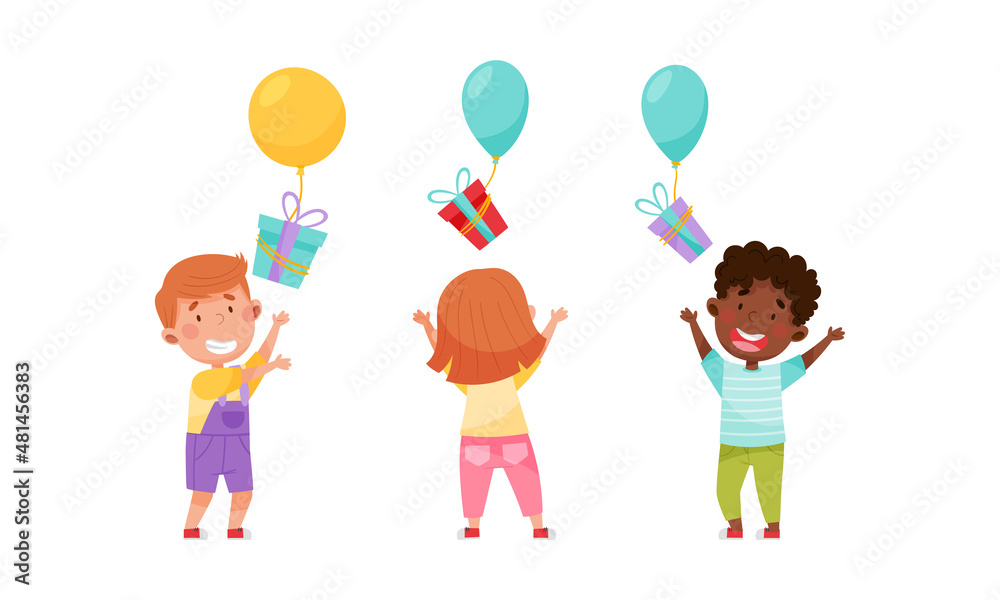 Fototapeta premium Set of happy kids holding balloons and gift boxes cartoon vector illustration