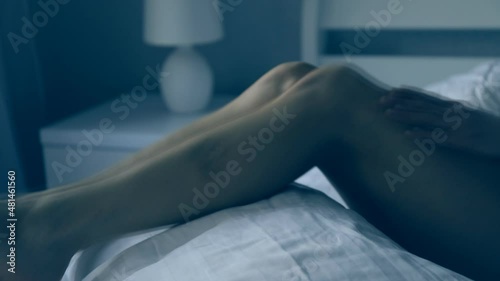Sexy woman bed. Bedroom. Sensual woman legs. Erotica.