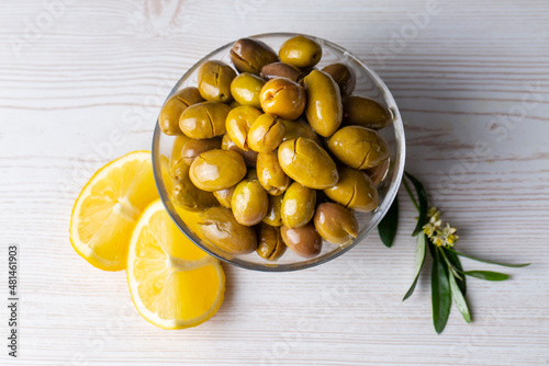 Cracked green olives. Crack...