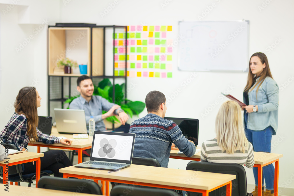 professor and students in a modern classroom