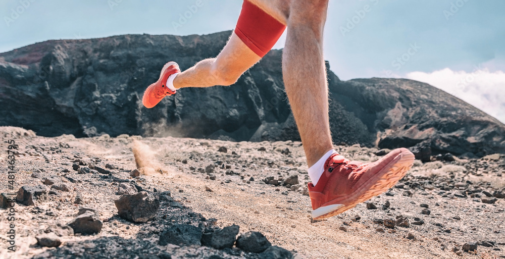 Reporter Mængde penge Vuggeviser Trail running man on exercising racing fast on volanic trek path in  mountain landscape. Closeup of athlete's foot and shoes jogging outdoors.  Stock Photo | Adobe Stock
