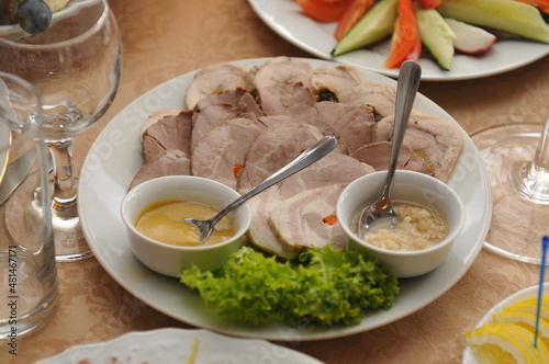 Meat slicing on the table, snacks in the restaurant