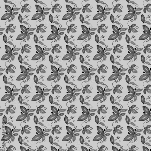 Vector image with a pattern of black curls and flowers on a gray silver background