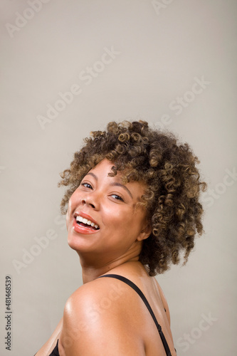 Studio shot of woman smiling