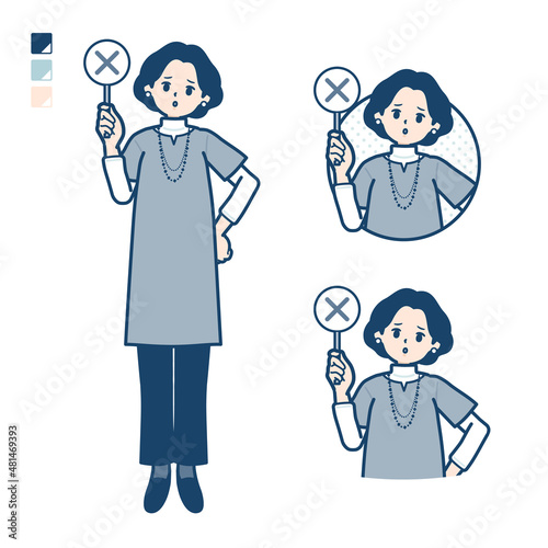 チュニック中年女性がバツ印パネルを出すイラスト