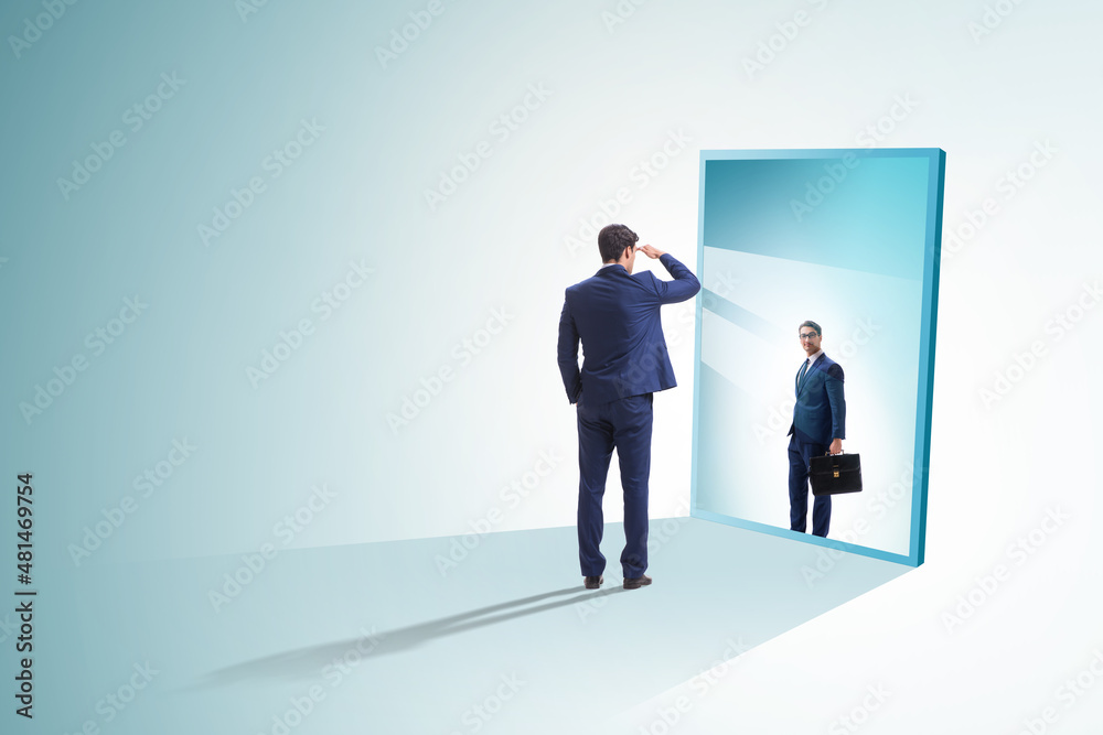 Young businessman in alter ego concept