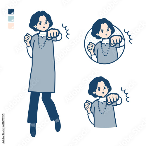 チュニック中年女性が正面にパンチしているイラスト