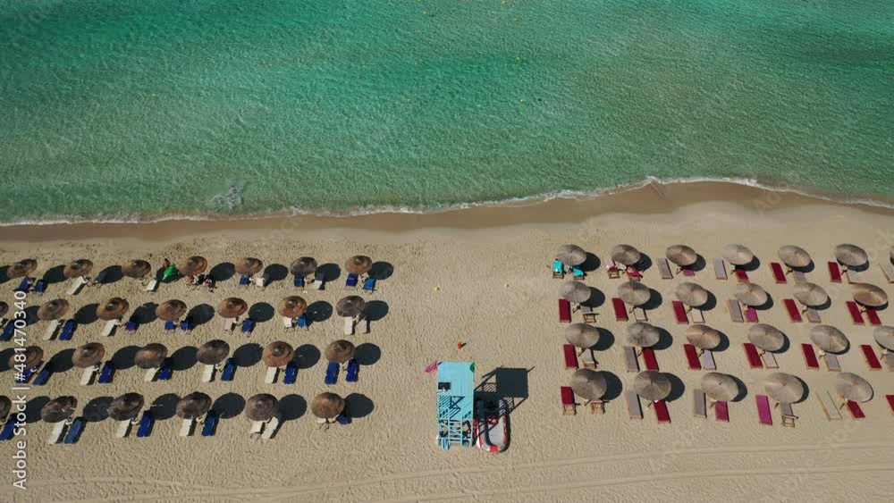 Aerial drone video of tropical paradise exotic island bay with emerald crystal clear beach visited by luxury yachts and sail boats in Caribbean destination Aerial drone video of tropical paradise exotic island bay with emerald crystal clear beach visited by luxury yachts and sail boats in Caribbean destination