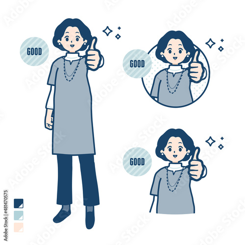 チュニック中年女性がサムズアップをしているイラスト